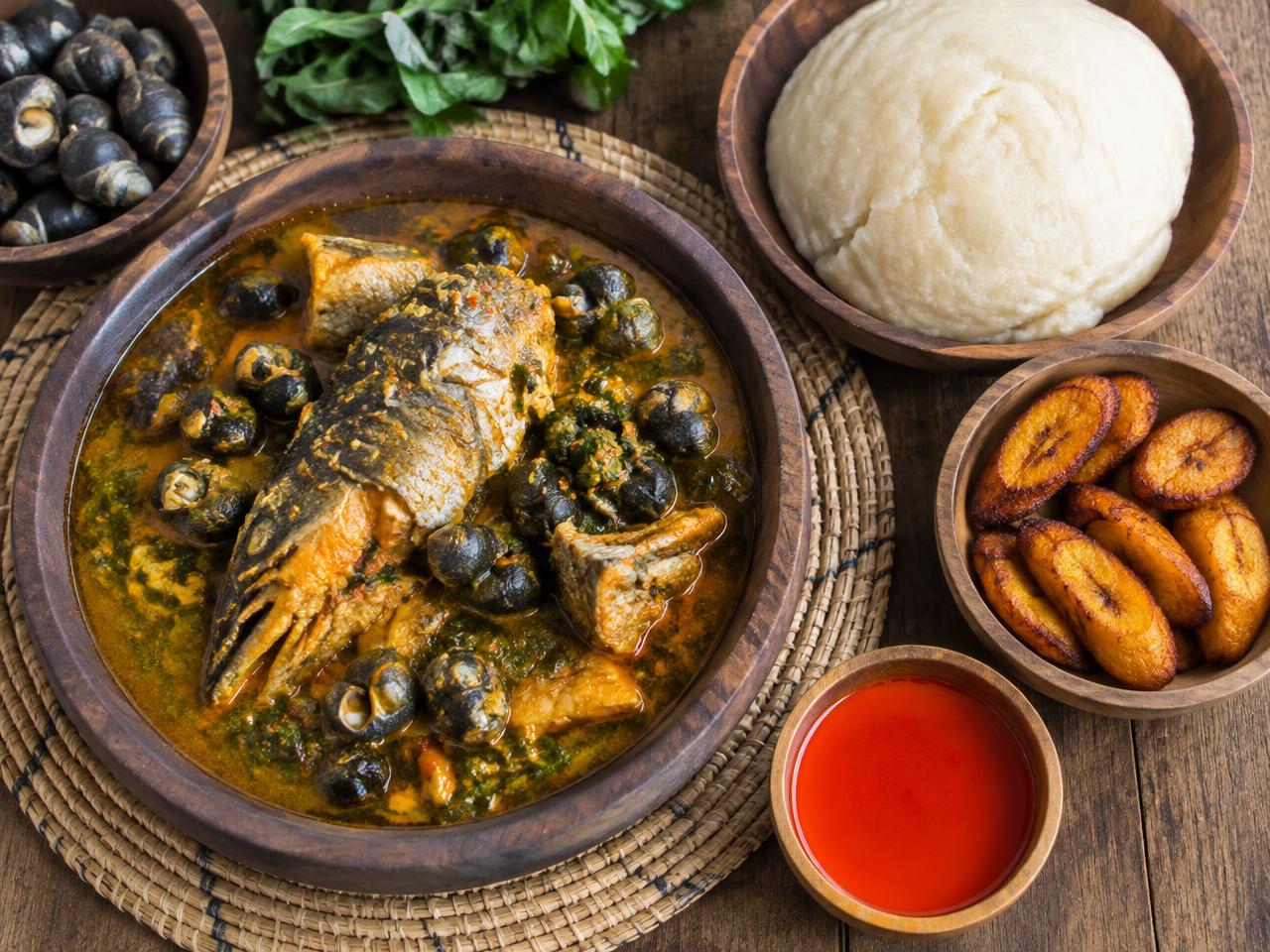 Fisherman soup with periwinkles, starch and fried plantain